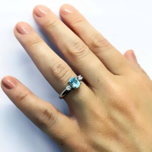 trilogy topazio azzurro e zirconi laterali